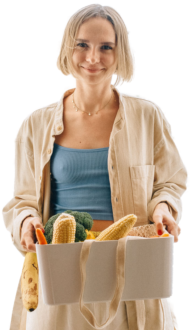Person carrying a bag of fresh groceries
